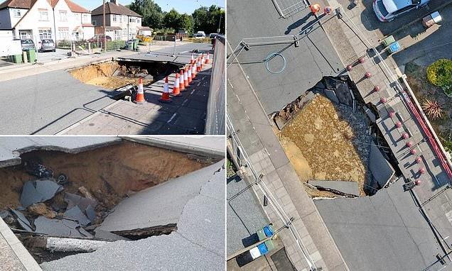 20ft-wide-sinkhole-opens-up-in-south-London-and-swallows-MOTORBIKE.jpg