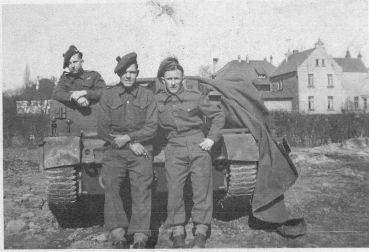 Dad, Bren carrier and cohorts, somewhere in germany..jpg