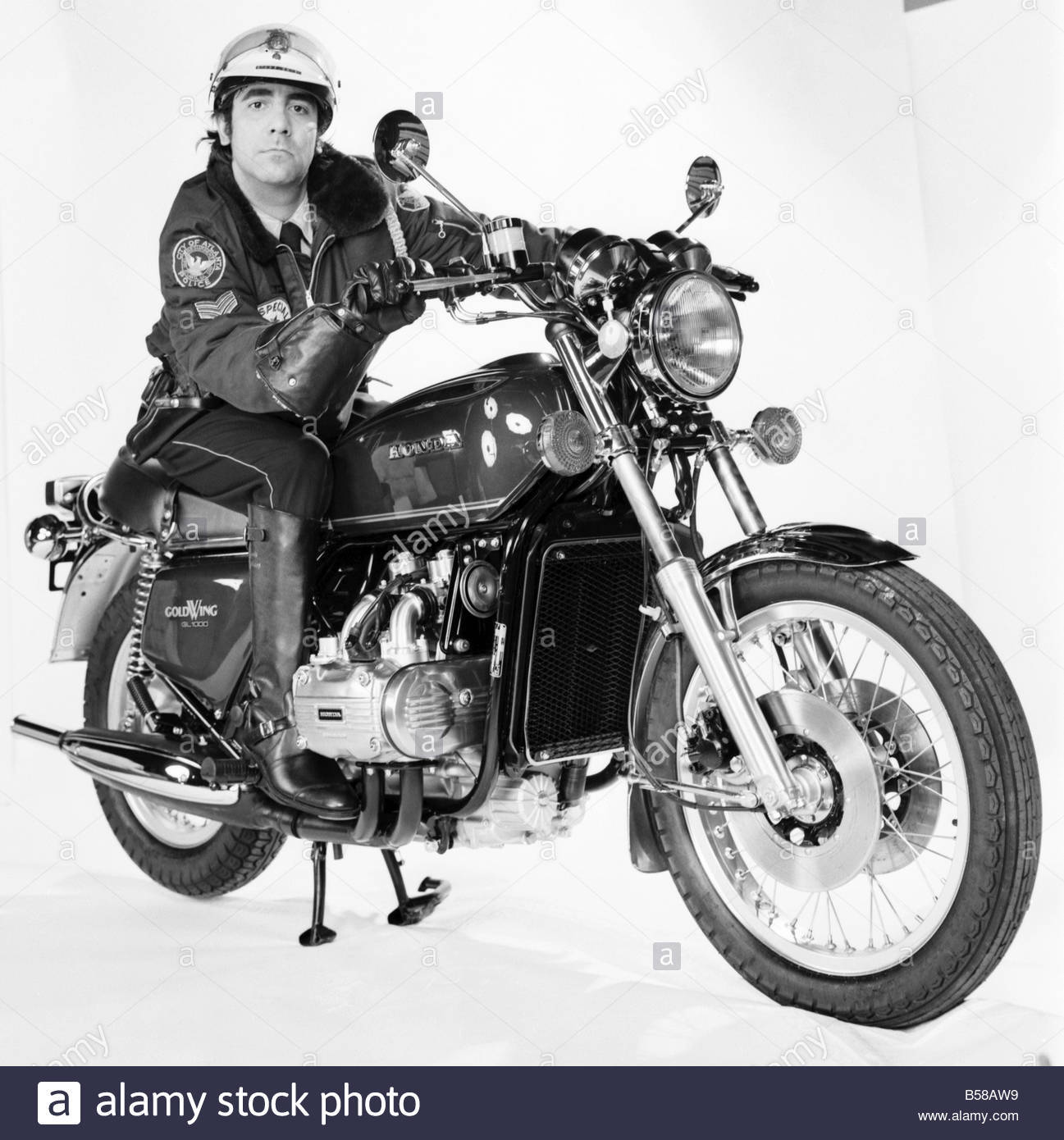 keith-moon-of-the-who-pop-group-on-a-honda-motorbike-january-1976-B58AW9.jpg