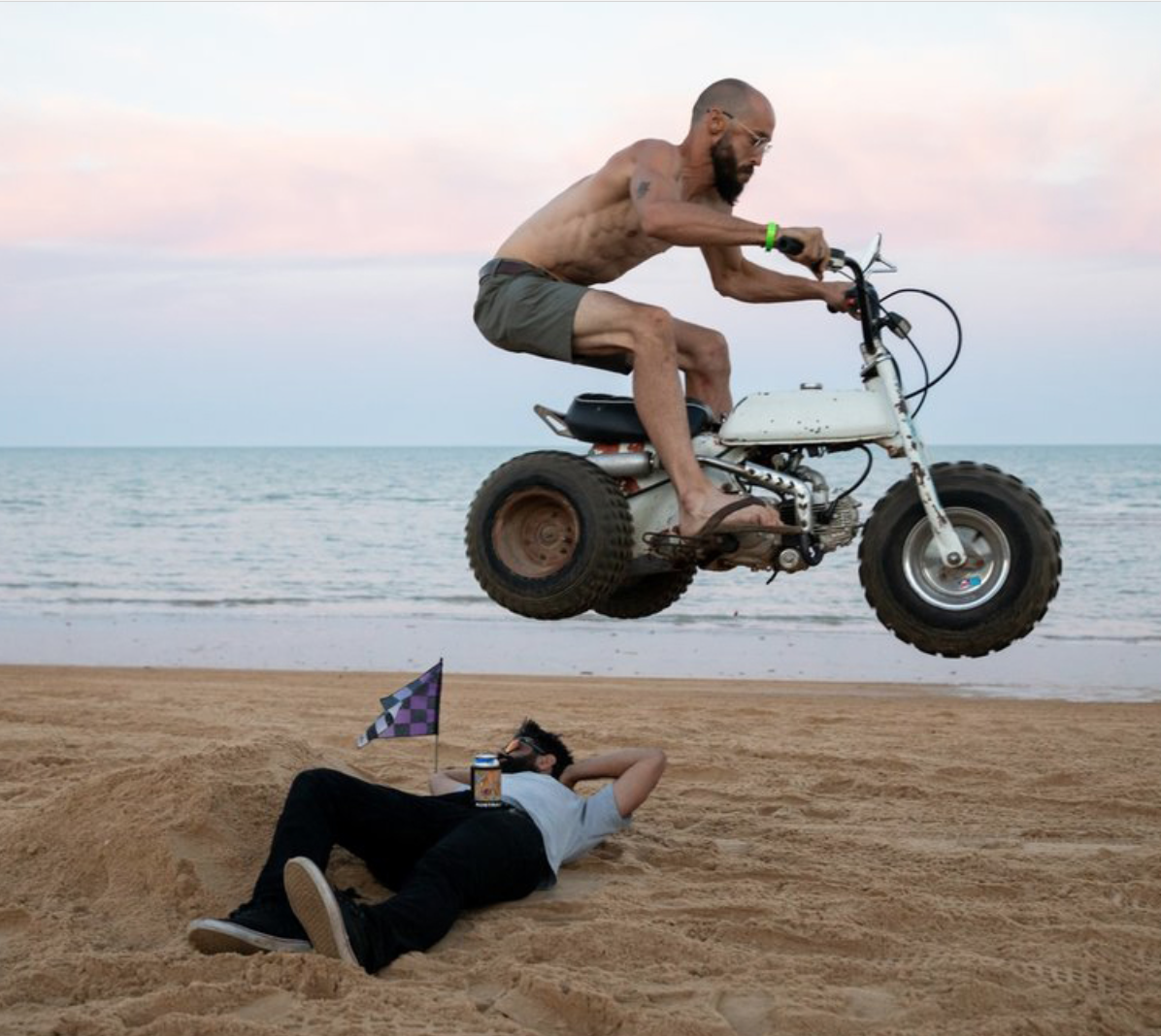 Leaping over beer on the beach.png