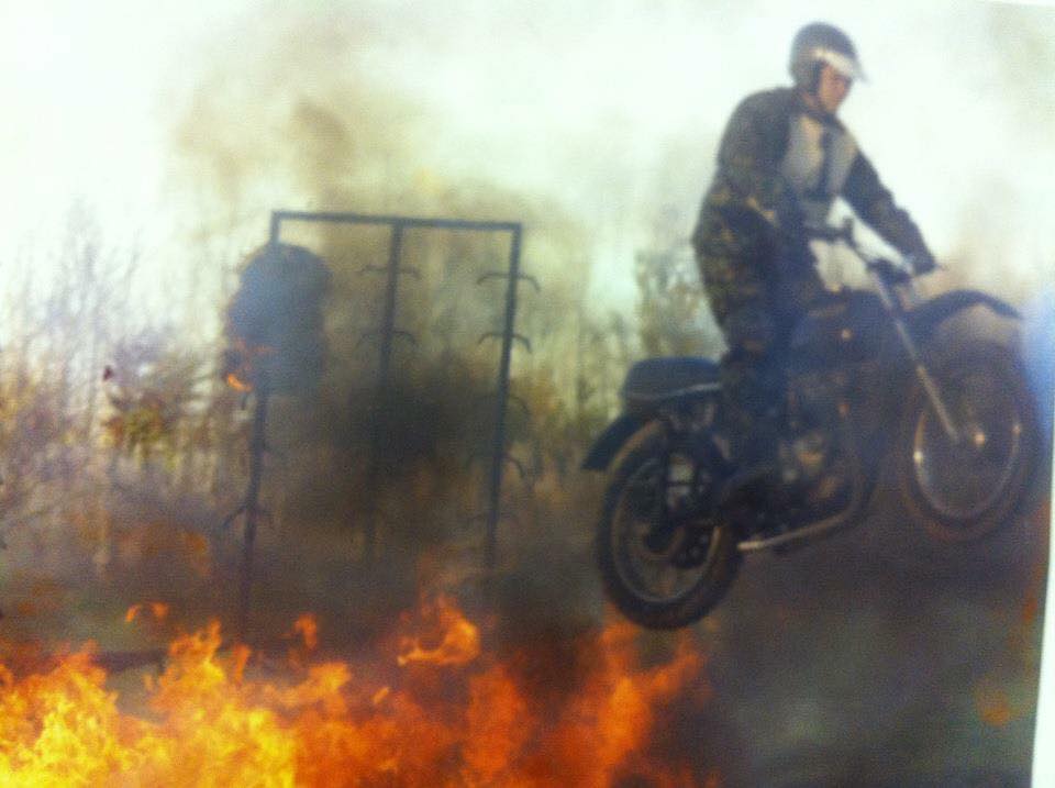 The bike is striped of its fancy show stuff while we spend time training. Still a TR7.